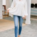 104055.AllCaughtupcreamwhiteruffledtunic.WHT1_