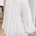 104055.AllCaughtupcreamwhiteruffledtunic.WHT7_